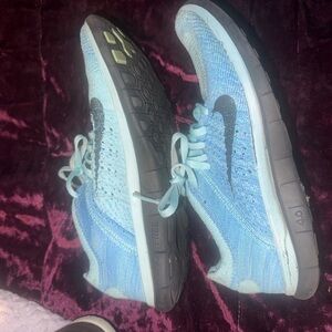 Nike Light Blue Knit Women's Running Shoes with Black Swoosh